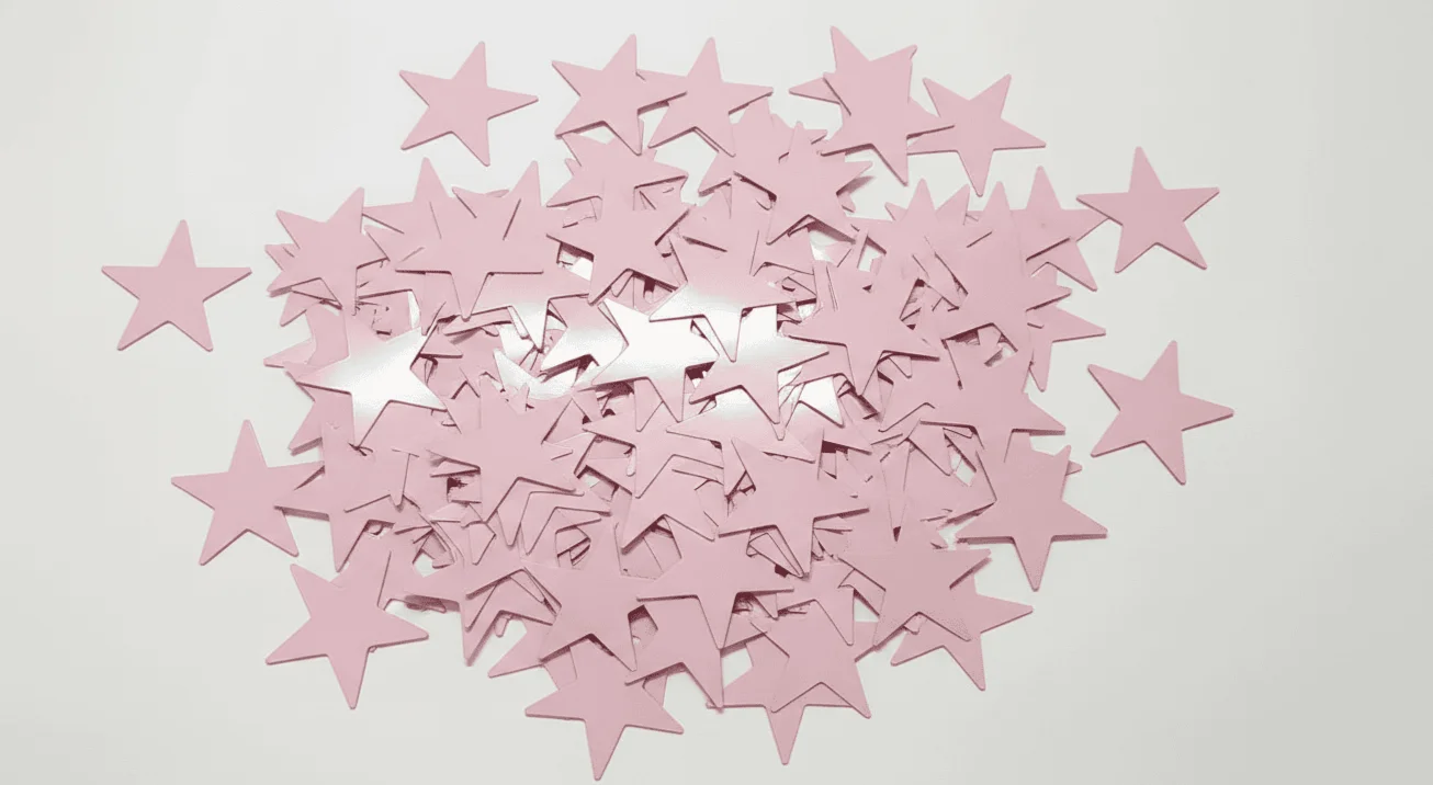 Confeti de estrellas rosa pastel